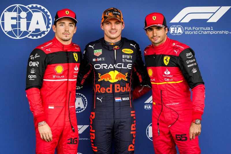 Ferrari driver Charles Leclerc, left, Red Bull's Max Verstappen, centre, and Carlos Sainz of Ferrari after qualifying for the Japanese Grand Prix. EPA