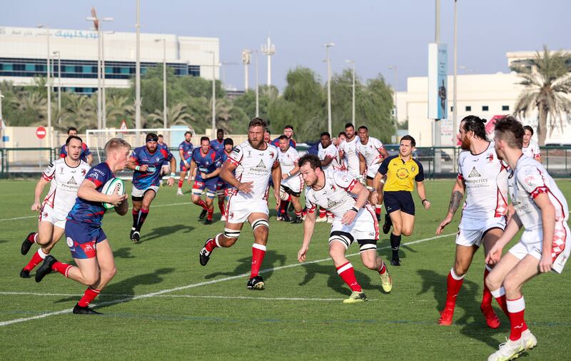 The Abu Dhabi Harlequins just had the edge over the Jebel Ali Dragons. Khushnum Bhandari/ The National