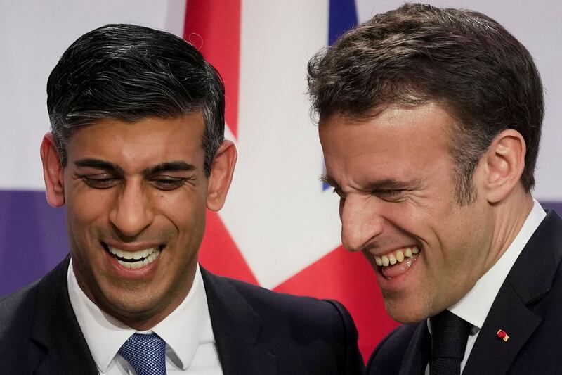 UK Prime Minister Rishi Sunak, left, and French President Emmanuel Macron appeared to be on good terms at a Franco-British summit in Paris. AFP