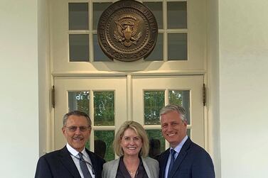 The incoming US Ambassador to the UAE, John Rakolta (L), poses with Victoria Coates, Senior Director for the Middle East at National Security Council, and the US National Security Advisor Robert O’Brien