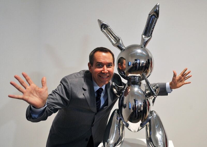 epa07574743 (FILE) - US artist Jeff Koons poses by his work 'Rabbit' during a press view of the exhibition 'Pop Life, Art In A Material World' at the Tate Modern in London, Britain, 29 September 2009 (reissued 16 May 2019). According to media reports, Christie's auction house in New York, USA sold 'Rabbit,' a 1.04 meter high stainless steel sculpture, for 91,075,000 USD (about 81,2 million EUR), exceeding the previous record price for the work of a living artist. There are three copies and one artist's proof of the artwork created in 1986.  EPA/DANIEL DEME