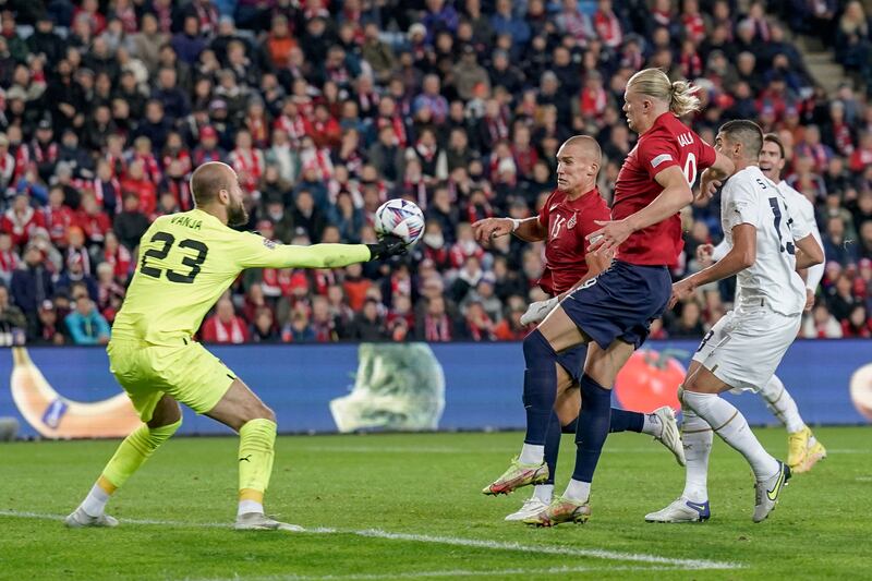 Serbia goalkeeper Vanja Milinkovic-Savic saves shots from Norway striker Erling Haaland. Reuters