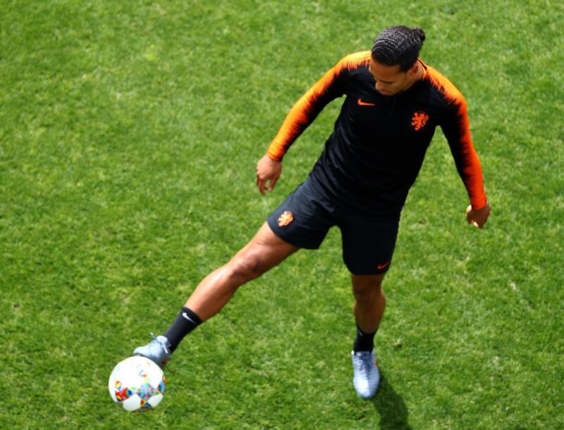 Virgil van Dijk warms up during the Netherlands training session prior to the UEFA Nations League Final. Getty Images