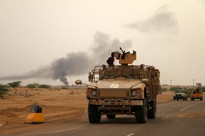 epa06823010 A column of Yemeni government forces and vehicles take position as they fight Houthi rebels in the western port city of Hodeidah, Yemen, 19 June 2018. According to reports, Yemeni government forces backed by
the Saudi-led coalition seized control of the airport of the port city of Hoeidah after deadly clashes with Houthi rebels, as part of a
wide-ranging military operation to retake Hodeidah, which is the main entry for food into the Arab country.  EPA/NAJEEB ALMAHBOOBI