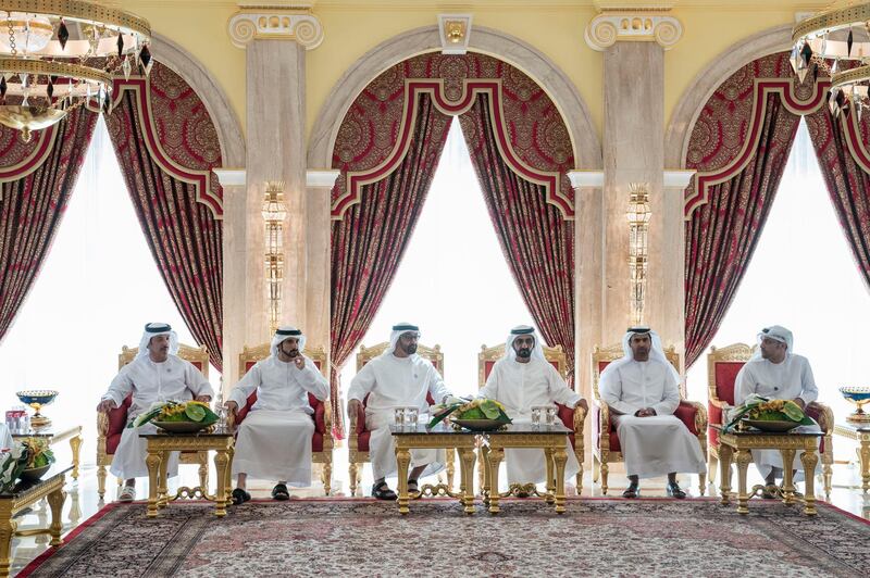 1DUBAI, UNITED ARAB EMIRATES - November 03, 2018: HH Sheikh Hazza bin Zayed Al Nahyan, Vice Chairman of the Abu Dhabi Executive Council (L), HH Sheikh Hamdan bin Mohamed Al Maktoum, Crown Prince of Dubai (2nd L), HH Sheikh Mohamed bin Zayed Al Nahyan Crown Prince of Abu Dhabi Deputy Supreme Commander of the UAE Armed Forces (3rd L) and HH Sheikh Mohamed bin Rashid Al Maktoum, Vice-President, Prime Minister of the UAE, Ruler of Dubai and Minister of Defence (4th L), receive the KhalifaSat engineering team, at Al Zabeel Palace.  

( Hamad Al Kaabi / Crown Prince Court - Abu Dhabi )
---