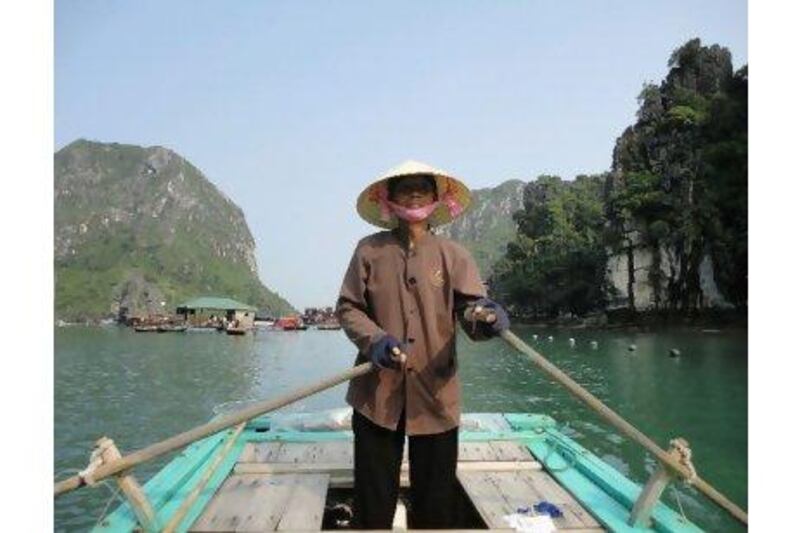 A fisherman in Halong Bay, Vietnam. Around 1,600 people live in four floating villages within the bay. Effie-Michelle Metallidis for The National