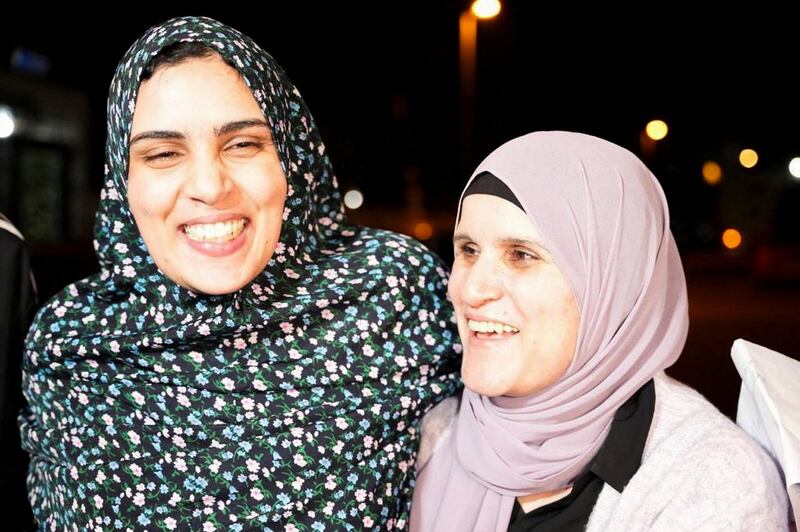 Ms Bakir with a family member in Jerusalem. Reuters