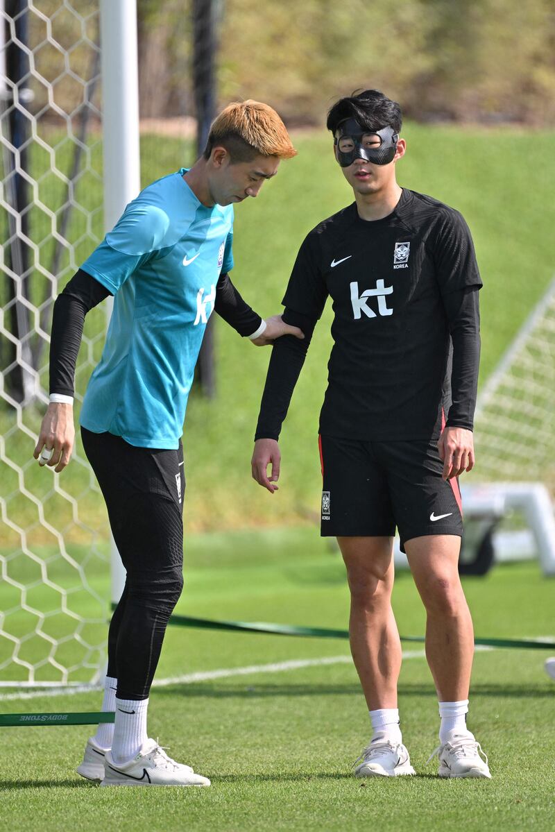South Korea's Son Heung-min and goalkeeper Jo Hyeon-woo train in Qatar. AFP