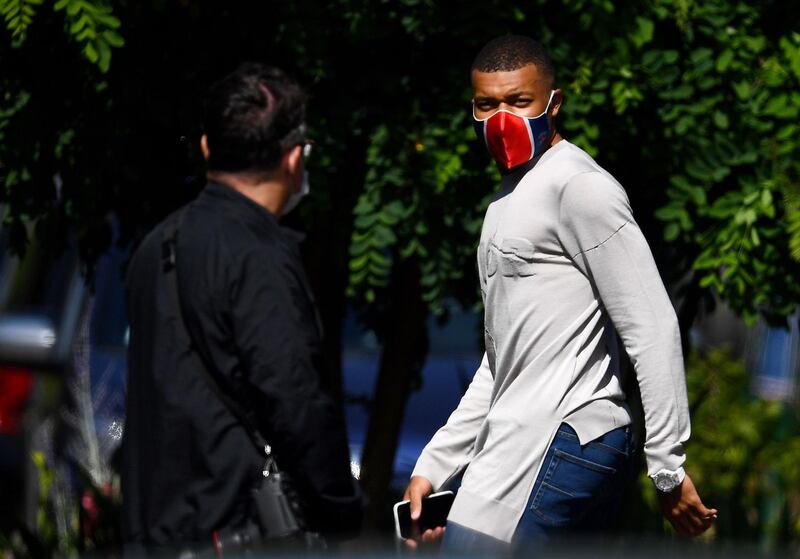 French forward Kylian Mbappe leaves the team's "Camp des Loges" training grounds. AFP