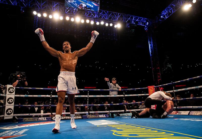 LONDON, ENGLAND - SEPTEMBER 22: Anthony Joshua celebrates victory over Alexander Povetkin during the IBF, WBA Super, WBO & IBO World Heavyweight Championship title fight between Anthony Joshua and Alexander Povetkin at Wembley Stadium on September 22, 2018 in London, England. (Photo by Richard Heathcote/Getty Images)