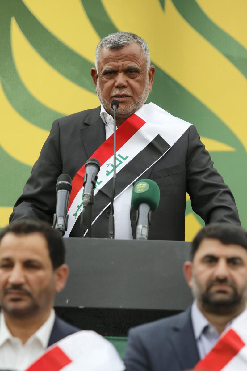 Hadi al-Ameri, head of the Badr organisation and leader of the mostly Shiite Hashed al-Shaabi paramilitary units, speaks during a campaign gathering in the city of Basra on April 21, 2018. / AFP PHOTO / HAIDAR MOHAMMED ALI