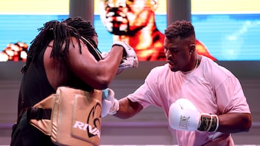 Francis Ngannou with his trainer Dewey Cooper ahead of his heavyweight fight against Anthony Joshua in Riyadh. Getty Images