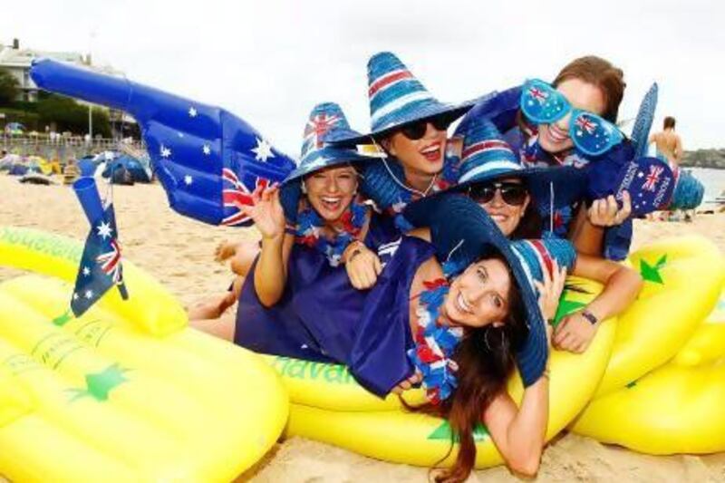 Revellers celebrating Australia Day on a Sydney beach. Brendon Thorne / Getty