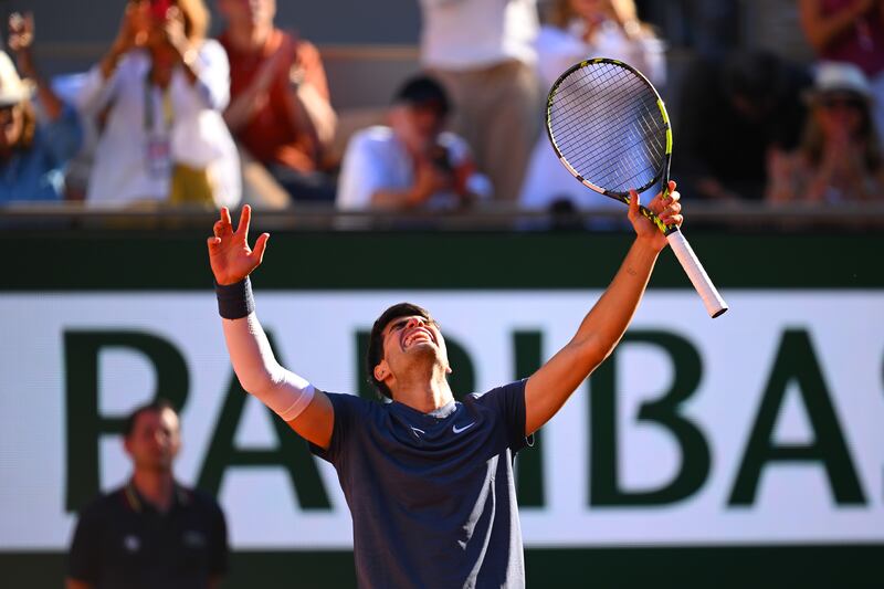 Carlos Alcaraz of Spain celebrates his five-set victory against Jannik Sinner of Italy in their French Open semi-final at Roland Garros on June 7, 2024. Getty Images