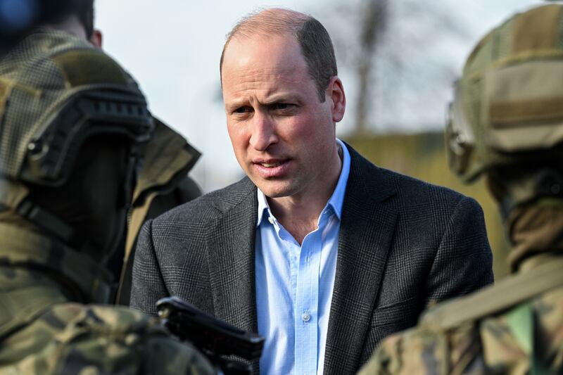 Britain's Prince William meets members of the armed forces. EPA