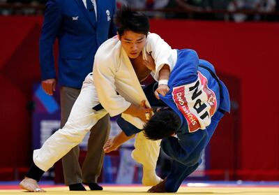 Judo - 2018 Asian Games - Men’s -73kg, Gold Medal Match - JCC Plenary Hall, Jakarta, Indonesia - August 30, 2018 - An Changrim of South Korea and Shohei Ono of Japan in action. REUTERS/Issei Kato