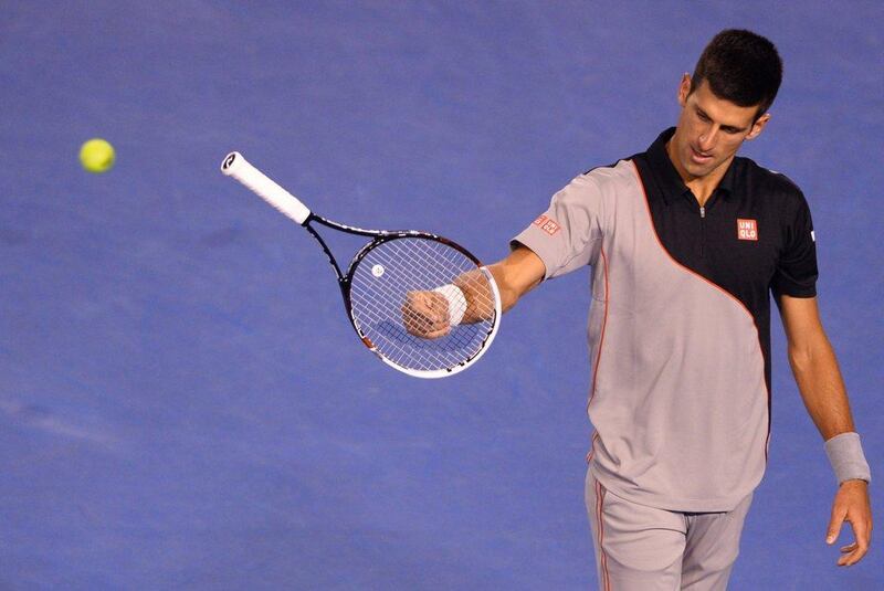 Novak Djokovic was eliminated from the Australian Open in the quarter-final round by Stanislas Wawrinka. William West / AFP