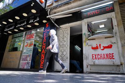 Currency exchange shops in Beirut. The World Bank says Lebanon's economic crisis is among the three most severe episodes since the mid-19th century. EPA 