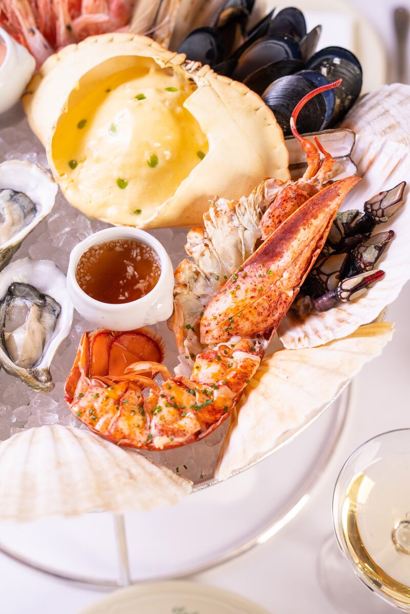 The plateau de Josette, a sharing platter of lobster, steamed prawns, oysters and clams, Dh950 