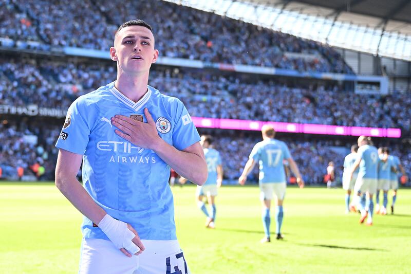 Phil Foden of Manchester City celebrates after scoring his team's first goal. Getty Images