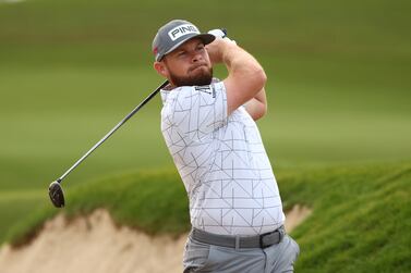 ABU DHABI, UNITED ARAB EMIRATES - JANUARY 19:   Tyrrell Hatton of England hits an approach shot during a practice round prior to the Abu Dhabi HSBC Championship at Yas Links Golf Course on January 19, 2022 in Abu Dhabi, United Arab Emirates. (Photo by Francois Nel / Getty Images)