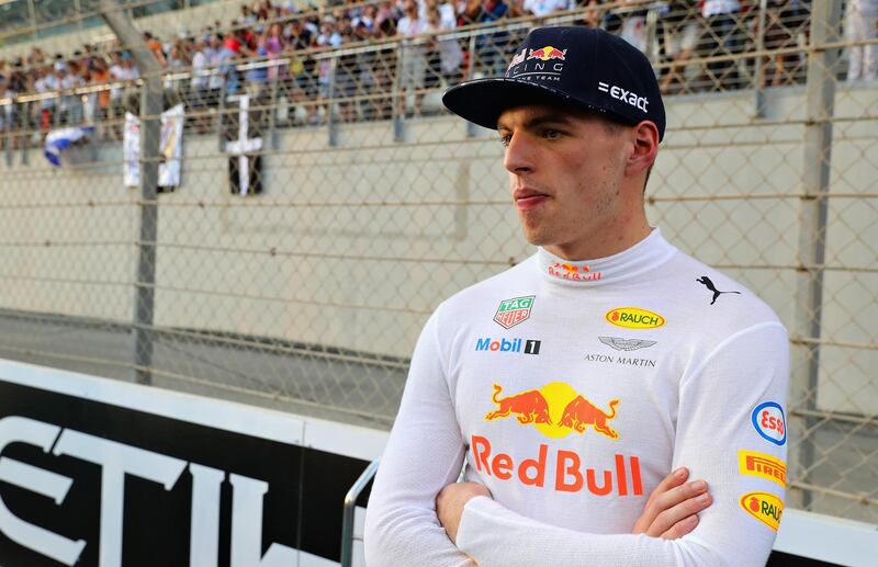 ABU DHABI, UNITED ARAB EMIRATES - NOVEMBER 26:  Max Verstappen of Netherlands and Red Bull Racing prepares to drive on the grid before the Abu Dhabi Formula One Grand Prix at Yas Marina Circuit on November 26, 2017 in Abu Dhabi, United Arab Emirates.  (Photo by Mark Thompson/Getty Images)