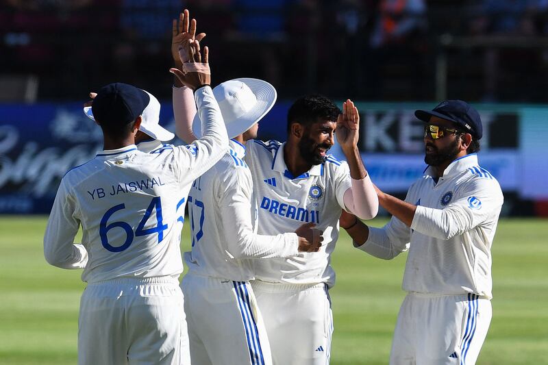 India's Jasprit Bumrah celebrates with teammates after the dismissal of South Africa's Tristan Stubbs. AFP