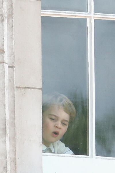 LONDON, ENGLAND - JUNE 08:  Prince George of Cambridge peers out of the window of Buckingham Palace during Trooping The Colour, the Queen's annual birthday parade, on June 8, 2019 in London, England.  (Photo by Chris Jackson/Getty Images)