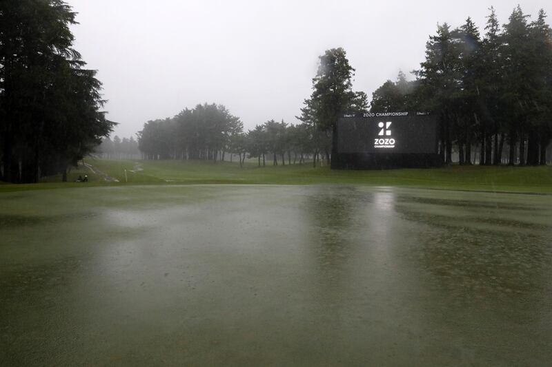 The flooded 18th green at the Zozo Championship in Japan as the second round was postponed due to heavy rain on Friday, October 25. Getty