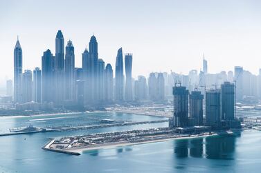 DUBAI, UNITED ARAB EMIRATES. 18 JANUARY 2021. Dubai skyline seen from St Regis hotel on the Palm Jumeirah. (Photo: Reem Mohammed/The National) Reporter: Section:
