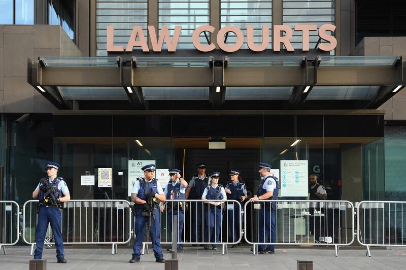 Armed police officers are seen in front of Christchurch High Court during the sentencing hearing. Getty Images