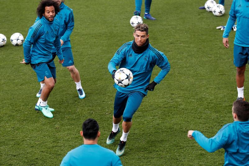 Cristiano Ronaldo, centre, takes part in a Real Madrid training session. Chema Moya / EPA