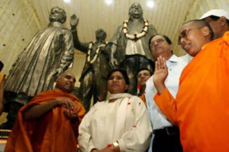 Mayawati, the chief minister Uttar Pradesh, centre, attends a prayer ceremony in New Delhi.