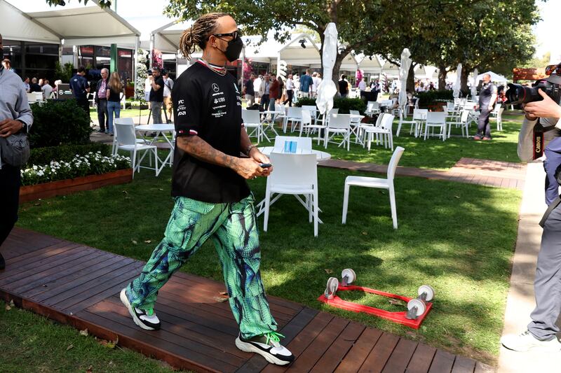 Mercedes driver Lewis Hamilton arrives at the track ahead of the Australian Formula One Grand Prix. AP