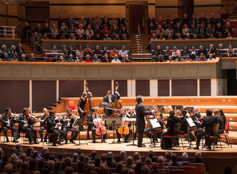 BIRMINGHAM, UNITED KINGDOM - MARCH 12: (EXCLUSIVE COVERAGE) Conductor Ben Gernon and Camerata Salzburg chamber orchestra perform on stage at Symphony Hall on March 12, 2015 in Birmingham, United Kingdom. (Photo by Steve Thorne/Redferns via Getty Images)