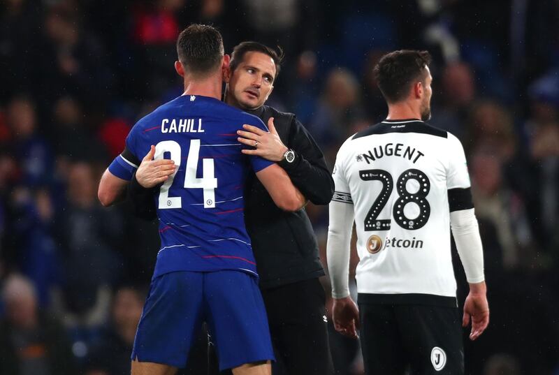 Frank Lampard embraces Chelsea defender Gary Cahill after the match. Getty Images