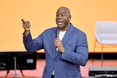 Magic Johnson has entered the metaverse after acquiring digital football and basketball franchises in SimWin Sports. AFP
