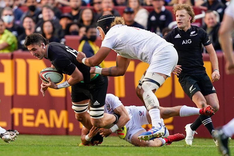 New Zealand's Josh Lord is tackled. AP Photo