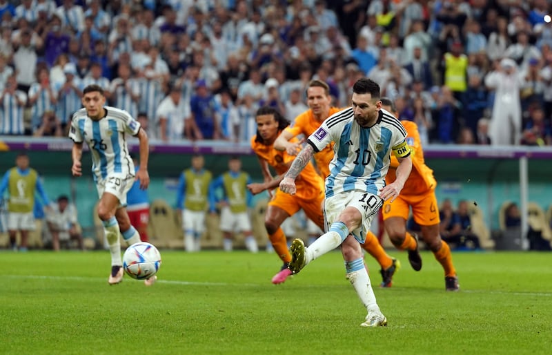 Argentina's Lionel Messi scores from the spot to make it 2-0. PA