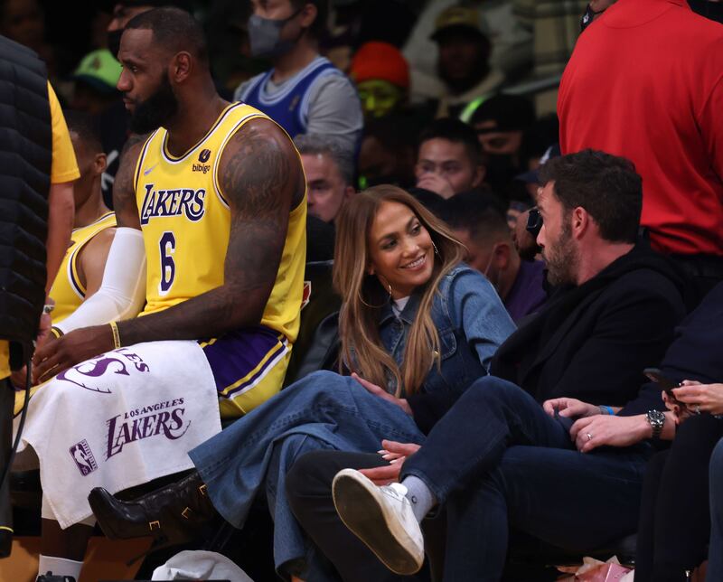 The sits courtside as the Los Angeles Lakers take on the Boston Celtics in Los Angeles, California. Getty Images / AFP
