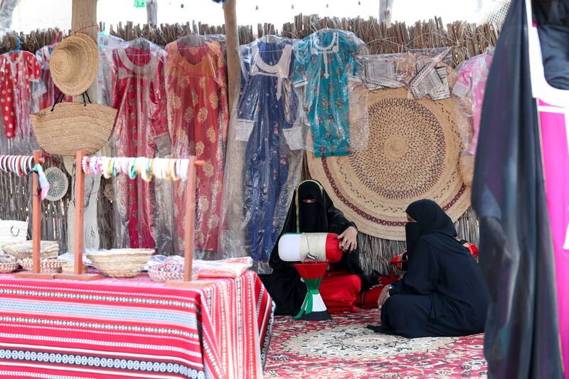 The Heritage Village on the Corniche in Abu Dhabi offers a glimpse of an older way of life, where people demonstrate skills such as metalwork, pottery and weaving. Khushnum Bhandari / The National