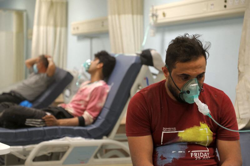 A patient suffering from breathing problems at a hospital in the city of Nasiriyah in Iraq's southern Dhi Qar province. AFP