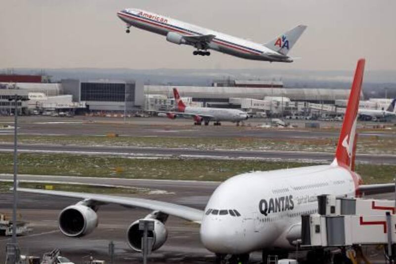 Planes are seen at Heathrow Airport in London, Thursday, Dec. 23, 2010. Normal operation has resumed at airports around Britain after days of disruption due to snow and freezing conditions. (AP Photo/Kirsty Wigglesworth) *** Local Caption ***  Britain_Europe_Weather_LKW107.jpg