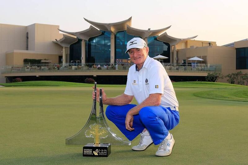 Chris Williams poses with the Sharjah Senior Masters trophy. Courtesy Sharjah Senior Masters