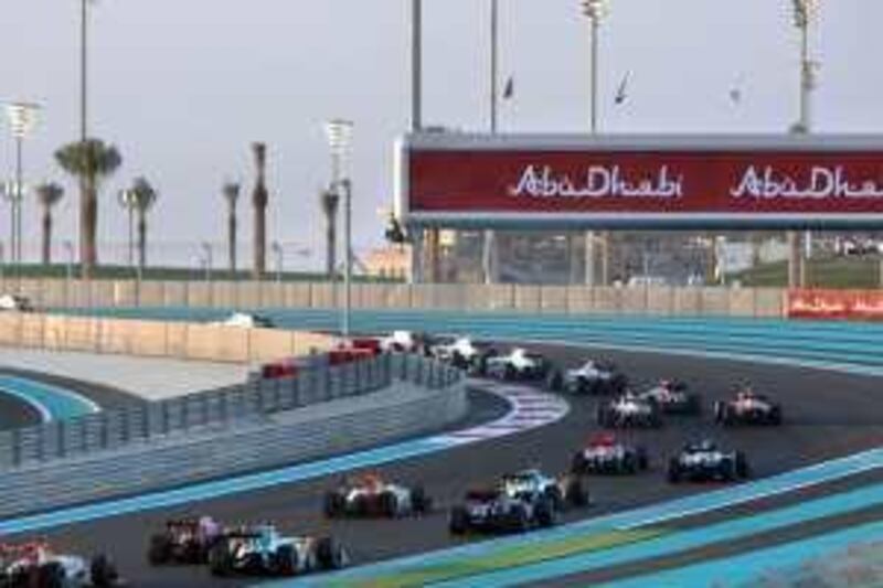 ABU DHABI, UNITED ARAB EMIRATES - NOVEMBER 01:  The cars stream through the second corner at the start of the first Abu Dhabi Formula One Grand Prix at the Yas Marina Circuit on November 1, 2009 in Abu Dhabi, United Arab Emirates.  (Photo by Mark Thompson/Getty Images) *** Local Caption ***  GYI0058796356.jpg *** Local Caption ***  GYI0058796356.jpg