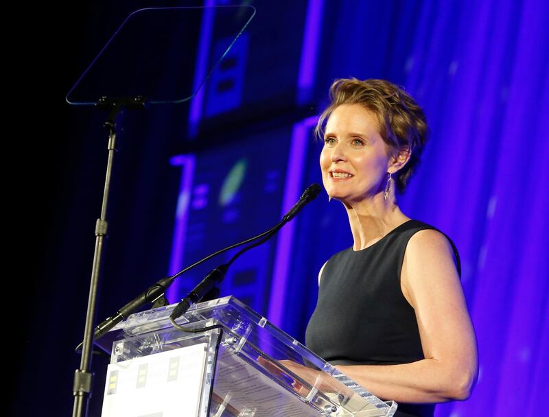 FILE - In this Feb. 3, 2018 file photo, Cynthia Nixon, former star of "Sex and the City," is honored by The Human Rights Campaign with an HRC Visibility Award in New York. Nixon said on Twitter Monday, March 19, 2018 that she'll challenge Gov. Andrew Cuomo in New York's Democratic primary in September. Her announcement sets up a race pitting an openly gay liberal activist against a two-term incumbent with a $30 million war chest and possible presidential ambitions. (Jason DeCrow/AP Images for Human Rights Campaign, File)