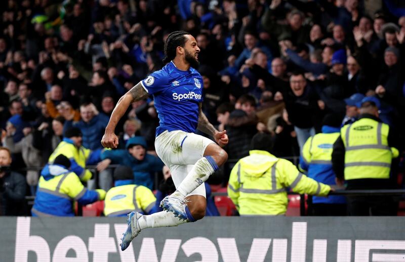 Everton's Theo Walcott celebrates scoring his team's winning goal at Watford. Reuters