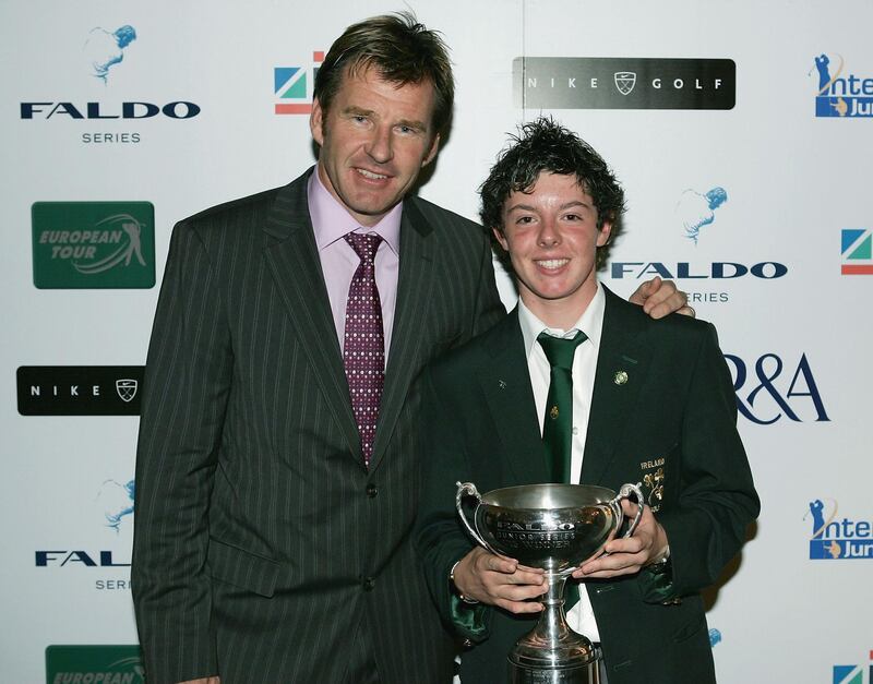 HERSHAM, ENGLAND - OCTOBER 11:  Nick Faldo with U15 boys winner Rory McIlroy pose during the 2004 Faldo Series Final, held at Burhill Golf Club on October 11, 2004 in Hersham, Surrey, England.  (Photo by Richard Heathcote/Getty Images)