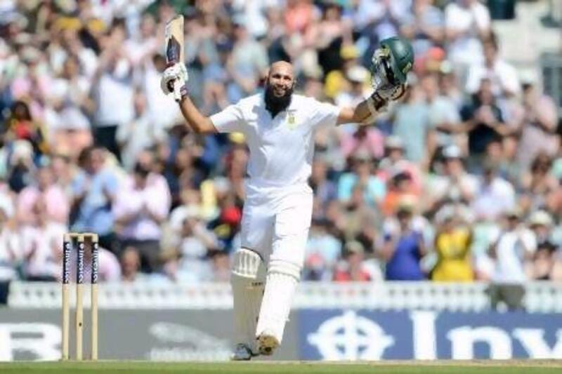 LONDON, ENGLAND - JULY 22: Hashim Amla of South Africa celebrates reaching his double century during day four of the 1st Investec Test match between England and South Africa at The Kia Oval on July 22, 2012 in London, England. (Photo by Gareth Copley/Getty Images) *** Local Caption *** 149021673.jpg