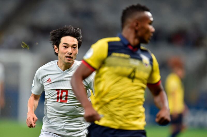 Japan's Shoya Nakajima, left, opened the scoring for Japan against Ecuador in the 15th minute  at the Mineirao Stadium in Belo Horizonte, Brazil. AFP